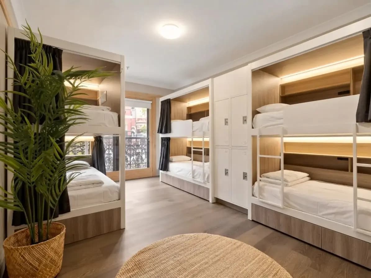 Curtained pod beds in a Sydney pod hotel room